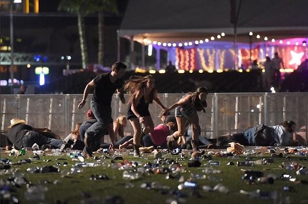 44F27C8700000578-0-People_flee_the_scene_of_the_shooting_in_Las_Vegas_Police_say_th-a-4_1506952690798.jpg